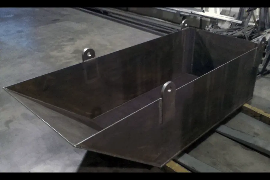 Photo of a grey metal industrial skip pan created by E-A Enterprises