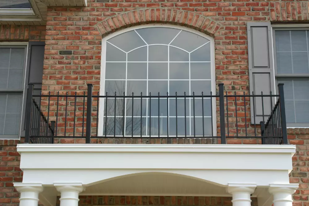 Photo of black metal residential railing for a balcony