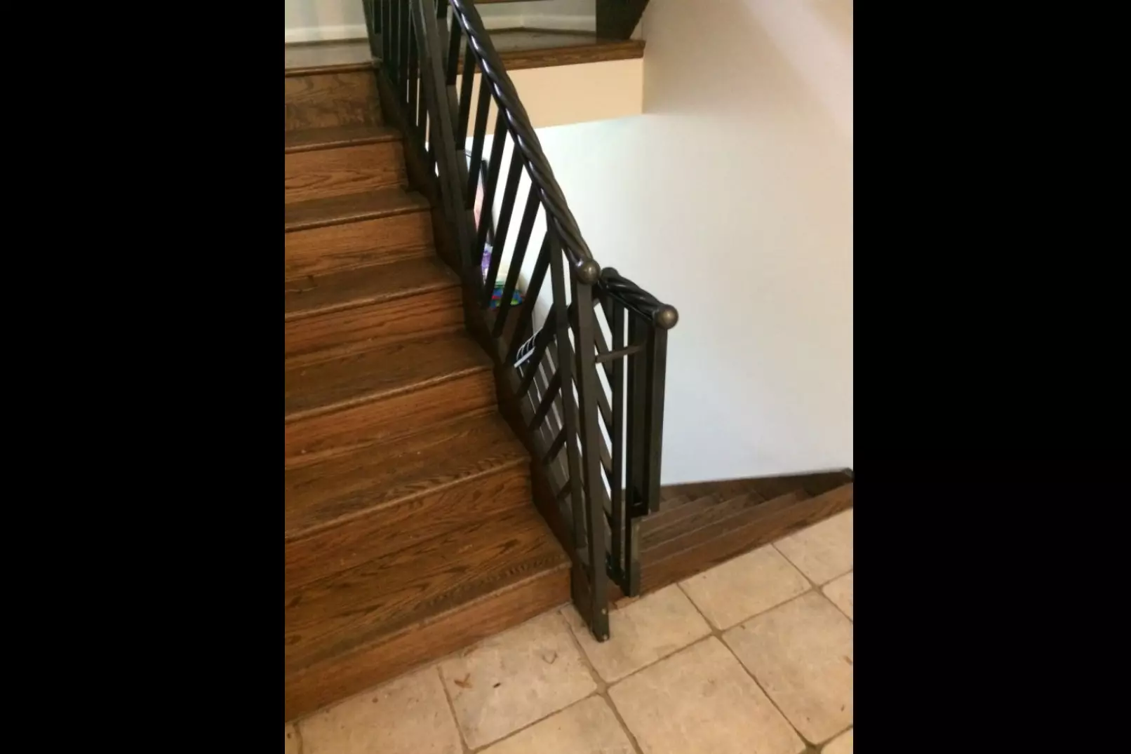 Photo of black metal railing for indoor residential staircase