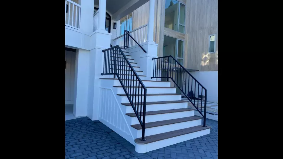 Photo of black metal railing for outdoor residential staircase
