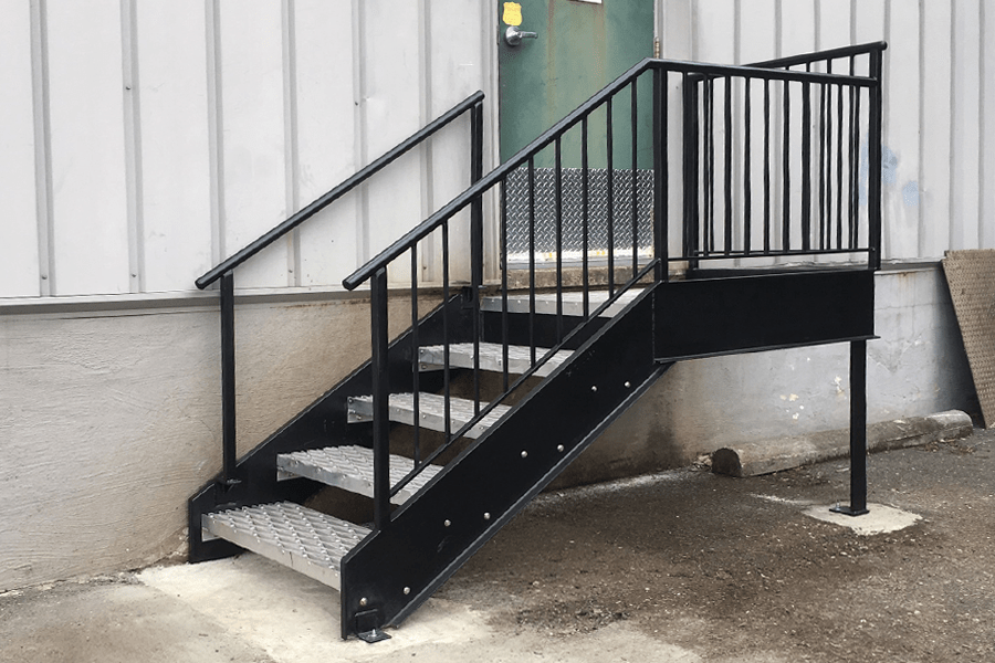Black metal gate for a road entrance